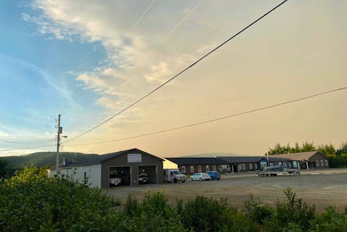 Smoke moves into Saint Albans, Newfoundland last week. Melanie Lowe and four other members of a team from Mount Saint Vincent University were stranded in the community for four days when forest fires closed the only road route out to Gander.