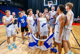 Nova Scotia men's basketball team celebrates its bronze medal win Saturday against Alberta at the 2022 Canada Games in St. Catharines, Ont. - LEN WAGG / COMMUNICATIONS NOVA SCOTIA