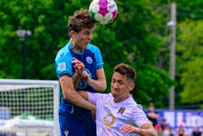HFX Wanderers' Samuel Salter heads the ball over a Valour FC defender during a Canadian Premier League match Saturday afternoon at the Wanderers Grounds. - TREVOR MacMILLAN / CANADIAN PREMIER LEAGUE