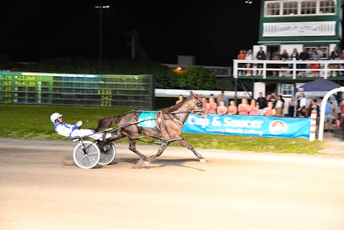 James MacDonald drives Sintra to a 1:50.3 victory in the second Gold Cup and Saucer Trial, presented by Atlantic Lottery, at Red Shores Racetrack and Casino at the Charlottetown Driving Park on Aug. 13. Gail MacDonald • Contributed