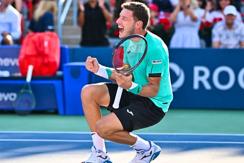 Pablo Carreno Busta of Spain celebrates his victory against Hubert Hurkacz of Poland in the final round at IGA Stadium in Montreal on Sunday.