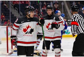 Team Canada's Logan Stankoven (10) celebrates a goal with teammates  during World Junior Hockey Championship action at Rogers Place in Edmonton, on Thursday, Aug. 11, 2022.