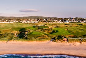 This aerial photograph shows the Cabot Links golf course in the foreground, while its golf lodge and villas sit between the course and the former coal mining community of Inverness. CONTRIBUTED/JACOB SJOMAN PHOTO