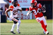  Stampeders running back Dedrick Mills runs the ball against the Lions on Saturday.