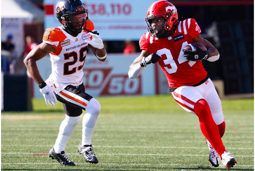  Stampeders running back Dedrick Mills runs the ball against the Lions on Saturday.