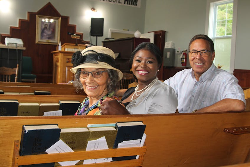 An Emancipation Day ceremony took place Aug. 14 at Gibson Woods Baptist Church. From left are deacon Geraldine Browning, Kenisha Gordon, diversity specialist with the Municipality of the County of Kings; and deacon chair Craig Gibson.  
Jason Malloy