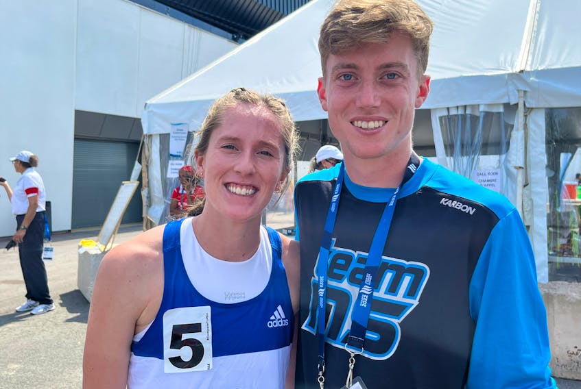 Nova Scotia 800-metre competitor Jane Hergett, left, and 1,500-metre runner Andrew Peverill celebrate their performances at the Canada Games in Niagara, Ont. - Len Wagg/Communications Nova Scotia
