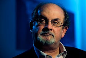 FILE PHOTO: British author Salman Rushdie listens during an interview with Reuters in London April 15, 2008.  REUTERS/Dylan Martinez/File Photo  Salman Rushdie: "How to defeat terrorism? Don’t be terrorized. Don’t let fear rule your life. Even if you are scared.” — Reuters file photo