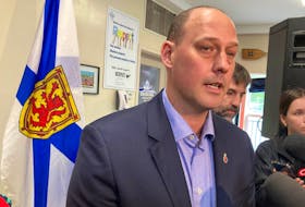Tim Halman, the provincial minister of environment and climate change, takes part in a federal-provincial announcement on land conservation at the Maskwa Aquatic Club in Halifax on Thursday, Aug. 18, 2022. - Francis Campbell photo