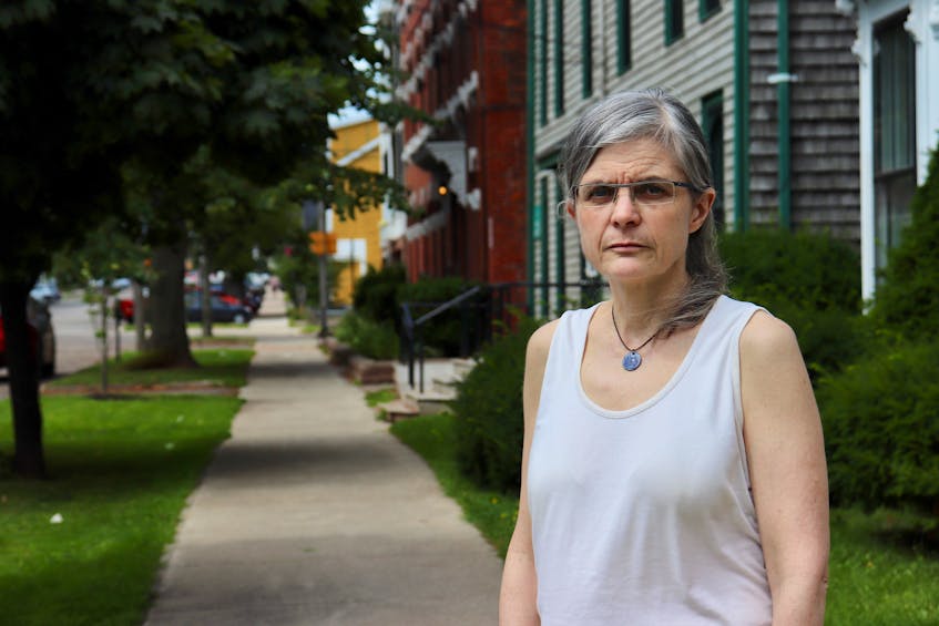 Andrea Battison, a longtime resident of downtown Charlottetown, says increased garbage and rowdiness in the area is a result of the city encouraging business and tourism growth, without supplying services like garbage cans and public washrooms. Logan MacLean • The Guardian