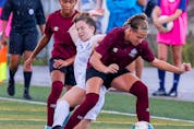 Rachel Kibble of Dartmouth goes down during the women's soccer match against Team New Brunswick at Youngs Sportsplex, Welland, Ont. - Len Wagg/Communications Nova Scotia