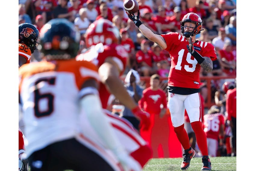  Stampeders quarterback Bo Levi Mitchell throws a touchdown pass to Jalen Philpot during a game against the B.C. Lions in Calgary on Saturday.