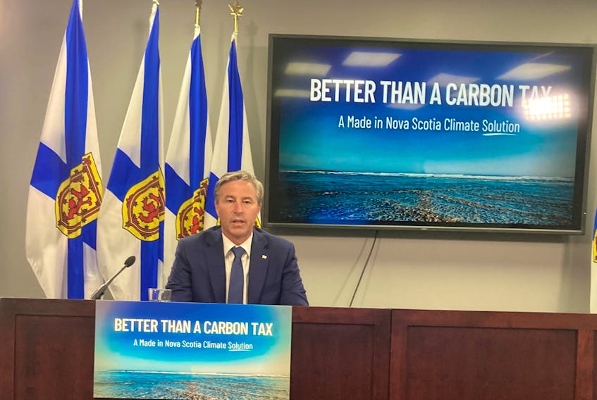 Premier Tim Houston delivers his better than a carbon tax plan in Halifax on Friday, Aug. 19, 2022. - Francis Campbell