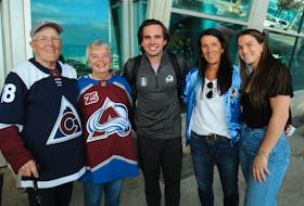 Colorado Avalanche Stanley Cup champion Alex Newhook arrived home at St. John’s International Airport on Friday night, July 8,  touching down just past 7:30 p.m. Shortly after, he met his familyand a few close family neighbourhood friends. He is expected to have the cup in the city for celebrations sometime in August. Above, Newhook (centre) is shown with (from left) his pop Eric Mercer, nan Ann Newhook, mom Paula and sister Abby.
-Joe Gibbons/The Telegram  These members of the Newhook family are just a small portion of the group that helped Alex (centre) every step of the way to becoming a Stanley Cup champion. Shown here are Newhook (centre) along with (from left) his pop Eric Mercer, nan Ann Newhook, mom Paula and sister Abby. Joe Gibbons/Telegram file photo
