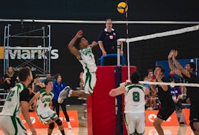 Team P.E.I.’s Jeremy Norman jumps in the air to spike the ball during male volleyball action in the 2022 Canada Summer Games in the Niagara region of Ontario. Team P.E.I. Photo • Special to The Guardian