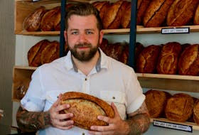 Noah Bedard, one of the owners of Windsor’s new Bedard Bakery, says he loves shaping the breads. Most types of breads he makes are a two-day process.