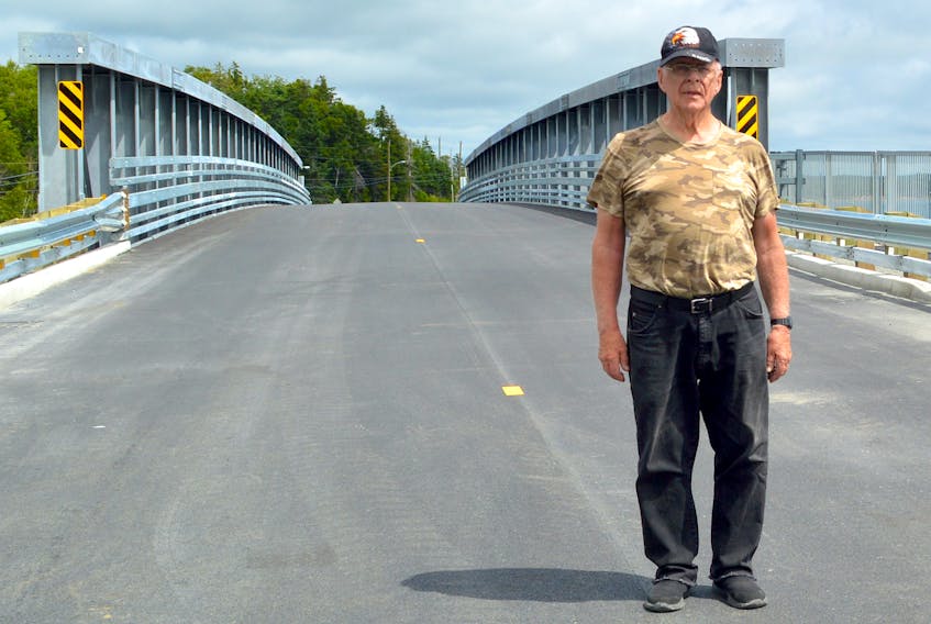 Mira Gut resident Don Burns said a new bridge has reconnected the communities on both sides of the Mira River. “It means that we’re not a community divided anymore.” Chris Connors/Cape Breton Post  Mira Gut resident Don Burns said a new bridge has reconnected the communities on both sides of the Mira River. Chris Connors/Cape Breton Post