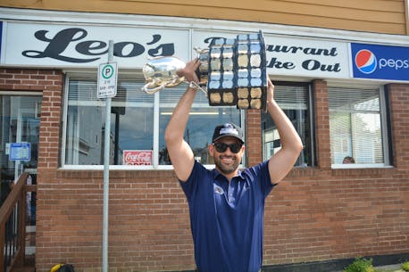 St. John’s native Travis Crickard eats fish and chips from Memorial Cup in hometown tour