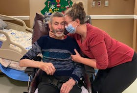 Mallory Wilson with her father Nicholas on their last Christmas together in December 2020, a couple months before he died. Contributed.