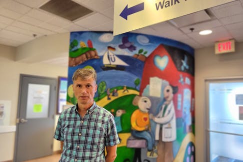 Kirk Deboer, facility manager at the Boardwalk Professional Centre, says demand at the Water Street walk-in clinic has been “extremely high”. At the same time, many physicians have been scaling back their hours due to the stresses of the COVID-19 pandemic. - Stu Neatby • The Guardian