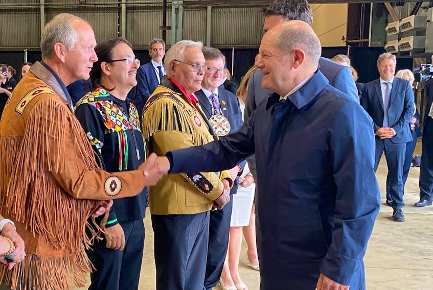 German Chancellor Olaf Scholz meets Stephenville Mayor Tom Rose and members of the Qalipu and Miawpukek First Nations on his arrival at Stephenville Aug. 23.