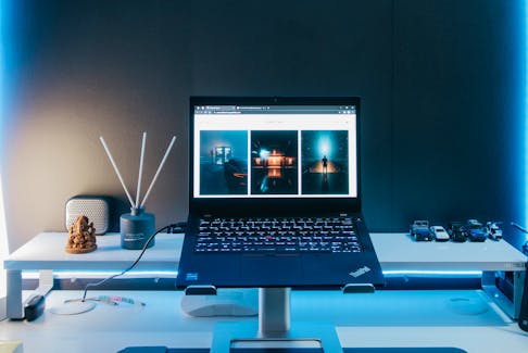 When setting up a home workstation, some of the important things to keep in mind include using a good chair that can be raised to the proper height and positioning computer screens at the correct level. - Unsplash