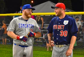Corson O’Rourke of the Sydney Sooners, right, and Ryan Kosolofski of the Edmonton Cubs chat after competing against each other in the Baseball Canada Senior Men’s National Championship home run derby championship round at the Susan McEachern Memorial Ball Park in Sydney, Wednesday. O’Rourke edged Kosolofski to win the title. JEREMY FRASER/CAPE BRETON POST.