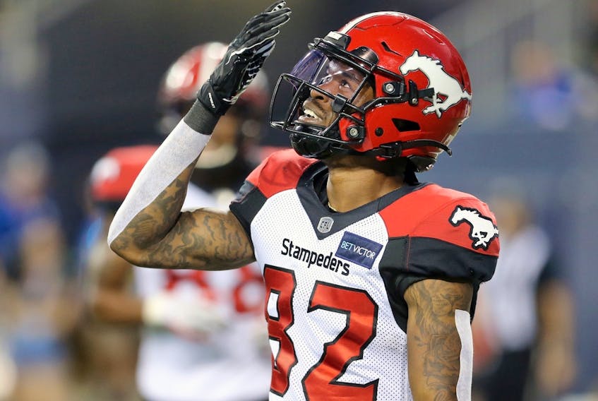 Calgary Stampeders receiver Malik Henry celebrates his touchdown against the Winnipeg Blue Bombers at IG Field in Winnipeg on Thursday, Aug. 25, 2022. 