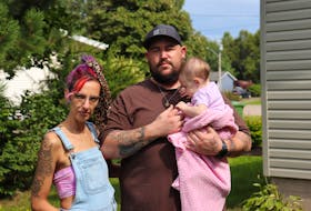 Amanda, left, and Derek James (holding their daughter, Sequoia) say a contractor hired through Jordan’s Principle to do renovations on their house did not finish the job and stole the money given to him by the federal government. - Logan MacLean • The Guardian