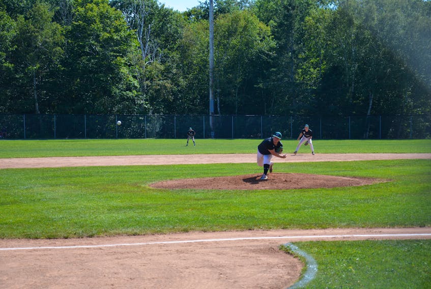 P.E.I. Gaudet’s Auto Body Islanders pitcher Jake Beck delivers a pitch in a New Brunswick/P.E.I. Senior Baseball League game at Memorial Field in Charlottetown. Beck pitched 4 1/3 innings of three-hit ball and combined with Brody MacDonald to toss the team’s third straight shutout at the Baseball Canada national senior men’s championship in Cape Breton on Aug. 27. Jason Simmonds • The Guardian