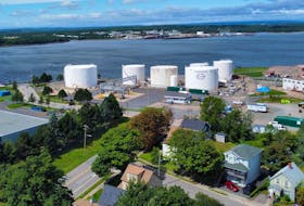 The Imperial Oil petroleum storage and distribution facility is located in Sydney's historic north end. As shown in this aerial photograph some of the houses are within 100 metres of the tank farm. One of the tanks was accidentally ruptured in July resulting in the leakage of about 600,000 litres of gasoline. DAVID JALA/CAPE BRETON POST