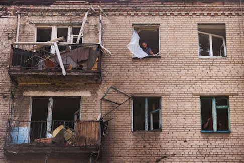 A Ukrainian man checks damage in houses following recent Russian shelling, as Russia's attack in Ukraine continues, in the city of Slovyansk, in Donetsk region, Ukraine August 28,2022. REUTERS/Ammar Awad  A Ukrainian man checks damage in houses following recent Russian shelling, as Russia's attack in Ukraine continues, in the city of Slovyansk, in Donetsk region, on Aug. 28,2022. REUTERS/Ammar Awad