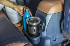 Use your vehicle’s cupholders for their intended purpose and not as a storage space for your phone. Ford photo