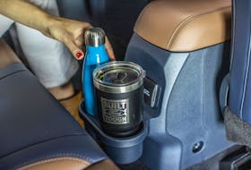 Use your vehicle’s cupholders for their intended purpose and not as a storage space for your phone. Ford photo
