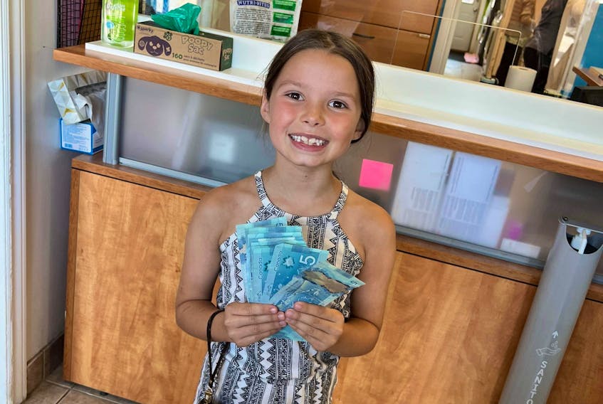 Ellie Milton, 8, of Halifax, recently donated a total of $120 to the Nova Scotia SPCA.  The money was raised on her birthday, when she had a ‘fiver party.’  - Contributed