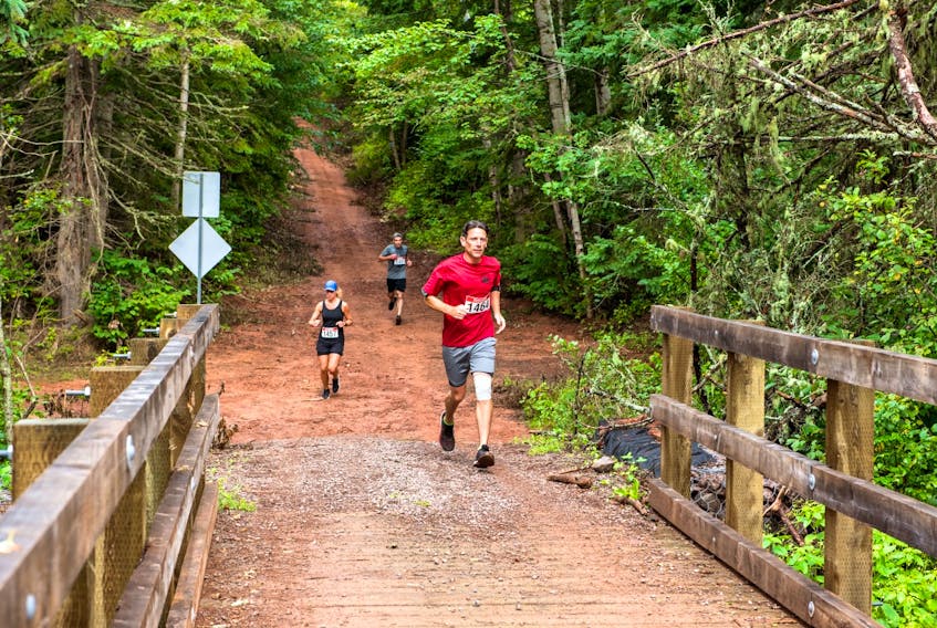 Runners enjoying the downhill as they approach the 6 kilometre mark at the 2022 Desmond Baglole Scenic Road Run. Submitted photo by Paul Baglole.