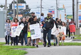 Family and friends of Colton Cook and Zack Lefave and supporters of their families participated in an Aug. 27 walk to keep the young men’s names on the public’s minds. Cook was murdered in September 2020 and Lefave has been missing since Jan. 1, 2021. TINA COMEAU PHOTO