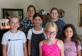 Some members of the Cantabile Truro Youth Singers (girls' choir). Pictured are: (back, left to right) Khiara and Calliana Zwickers, (middle) Rory Boulton, Zoë Millar and Georgia Prest, and Sydney Dellano (front).