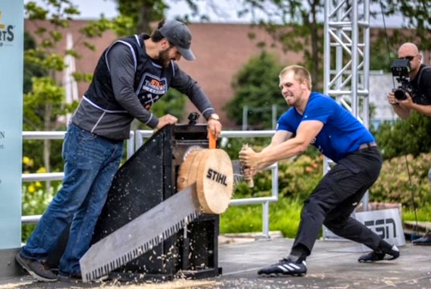 Thian Carman powers through his cut in the single buck competition at the Stihl Timbersports Canadian championships in P.E.I. where he won the Rookie division title. Contributed.