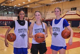 Four Annapolis Valley athletes will play for Nova Scotia’s women’s basketball team at the Canada Games in the Niagara Region of Ontario. Before a recent team practice in Wolfville are, from left, Ali Oluyole, Vanessa Vaughan and Lauren Hainstock. Grace Walton was with the province’s under-17 team in Quebec.Lauren Hainstock, left, looks to drive on Ali Oluyole during the Nova Scotia Canada Games women’s basketball team’s practice July 30 at Acadia University.
Jason Malloy