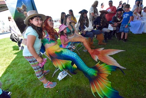 There were lots of kids excited for the opportunity to have their photos taken with the Halifax Mermaids who made the excursion to Digby to participate in Scallop Days events during the 2019 Scallop Days Festival. The pirates of the Maritime Pirate Alliance were also a huge hit that year for photos.  TINA COMEAU PHOTO

