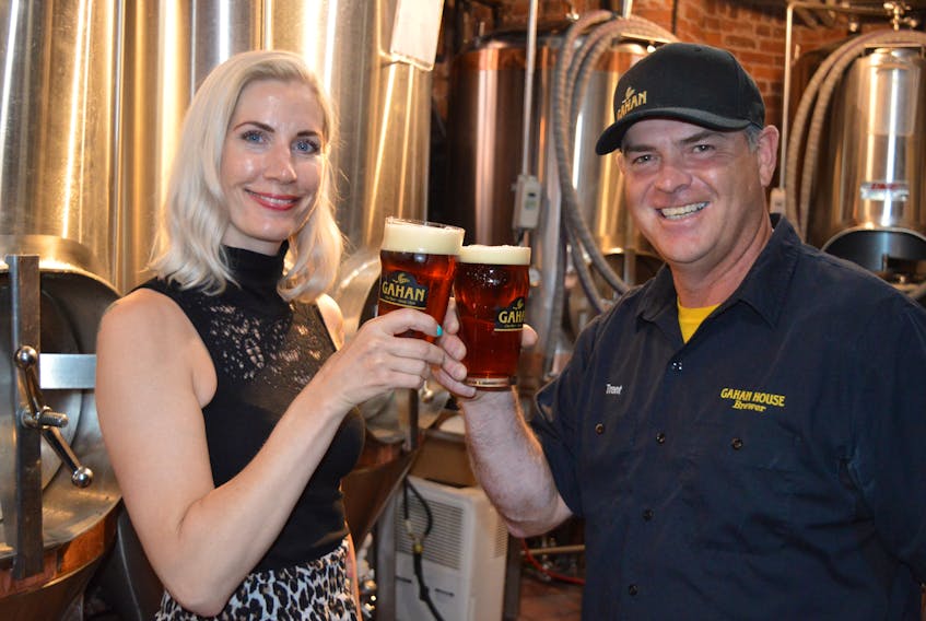 Mary Beth Keefe, left, head brewmaster with the Granite Brewery in Toronto, and Trent Hayes, head brewmaster with the Gahan Brewery in Charlottetown, collaborated to come up with a new Irish craft beer both locations will begin selling later this month. Dave Stewart • The Guardian