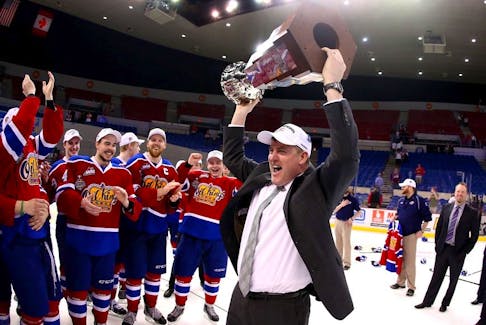 Edmonton Oil Kings Head Coach Derek Laxdal holds up the Western Hockey League's Ed Chynoweth Cup after beating the Portland Winterhawks on Monday May 12, 2014 to win the the WHL championship.  