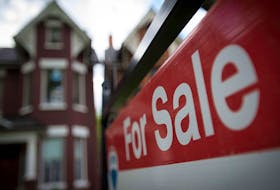 Toronto home prices slid just over six per cent in July from a month earlier, hitting an average of $1.074 million, according to data from the Toronto Regional Real Estate Board. 