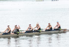 VERSO senior ladies' crew made history at the 204th Royal St. John’s Regatta at Quidi Vidi Lake on Thursday as they were the first crew to race and win the long course with a time of 10:28. Crew members are coxswain Emma Ramsay, stroke Katie Wadden, No. 5 Alyssa Devereaux, N0. 4 Jane Brodie, No. 3 Nancy Beaton, No. 2 Stephanie Davis and No. 1 Connie Duffett. They were presented with the new Women’s Long Course OZ~FM Women’s Crew Trophy, donated by members of the 1994 OZ~FM record breaking crew alumni members some of whom were on hand to present the new silverware at the 204th. Regatta. -Photo by Joe Gibbons/The Telegram