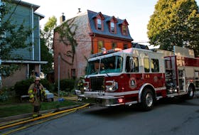 FOR NEWS STORY:
Halifax regional firefighters on the scene of a fire in an apartment building at 5671 Bloomfield in Halifax Thursday August 4, 2022. 

TIM KROCHAK PHOTO