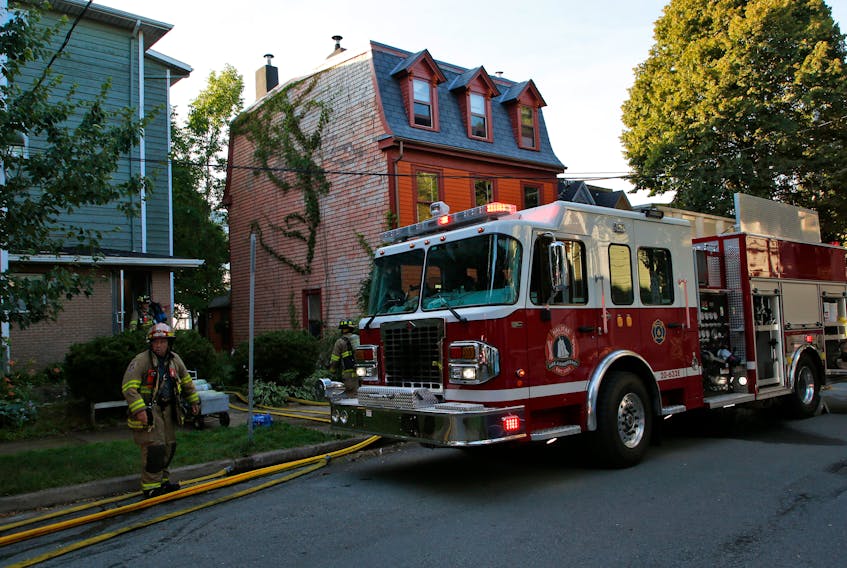 FOR NEWS STORY:
Halifax regional firefighters on the scene of a fire in an apartment building at 5671 Bloomfield in Halifax Thursday August 4, 2022. 

TIM KROCHAK PHOTO