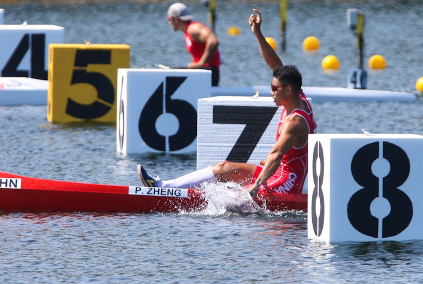 FOR SPORTS STORY:
Pengfei ZHENG of China celebrates his first place finish in the C1 men 1000 semifinal at Canoe '22 on Lake Banook in Dartmouh Thursday August 4, 2022.

TIM KROCHAK PHOTO