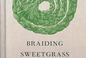 The cover to Braiding Sweetgrass by Robin Wall Kimmerer. Contributed