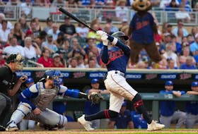 Twins batter Nick Gordon hits a three-run home run during the fourth inning against the Blue Jays at Target Field in Minneapolis, Friday, Aug. 5, 2022.